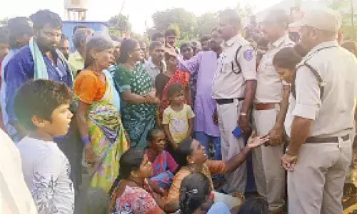 Family stage protest after officials demolish their house