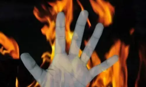 Teen girl immolates herself, man found hanging in house nearby