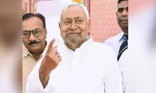 Bihar polls: CM Nitish Kumar casts his vote in Bakhtiyarpur, shows inked finger Bihar polls: CM Nitish Kumar casts his vote in Bakhtiyarpur, shows inked finger