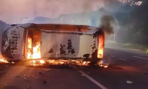 Telangana: Car catches fire after hitting divider in Nalgonda