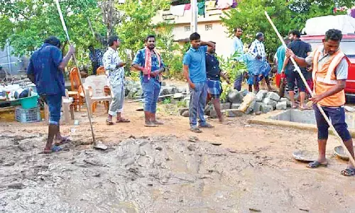 Relief measures underway in flood-hit villages of Satyavedu Relief measures underway in flood-hit villages of Satyavedu