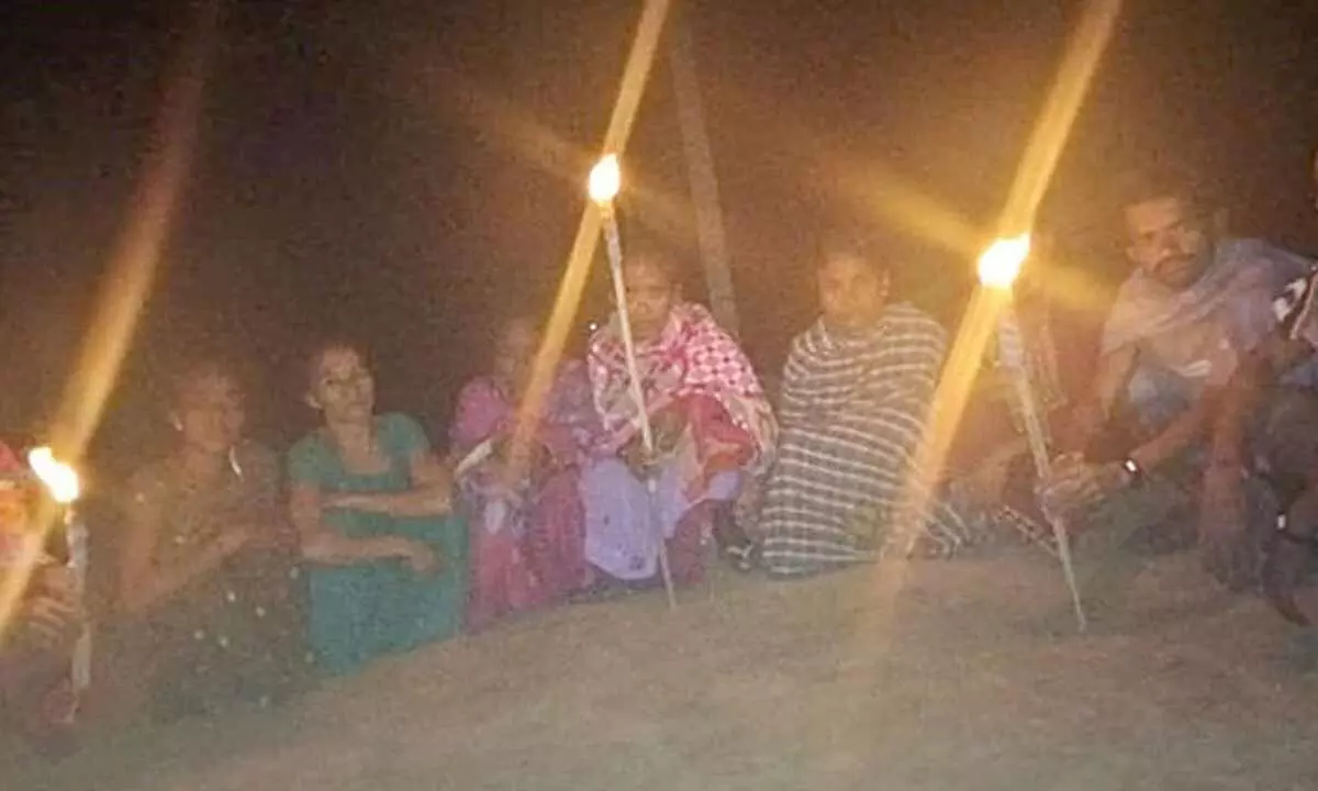 Tribals protest with torches demanding electricity Tribals protest with torches demanding electricity