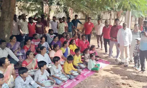 Workers stage protest demanding pending salaries