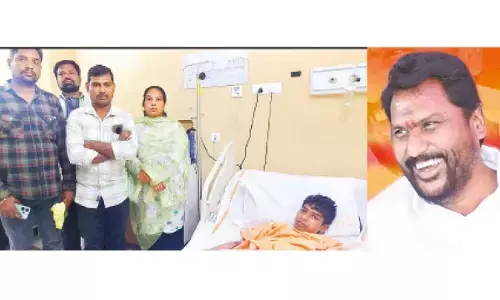 Minister shows humane side of his personality: Adluri Laxman takes special care of boy injured by lightning