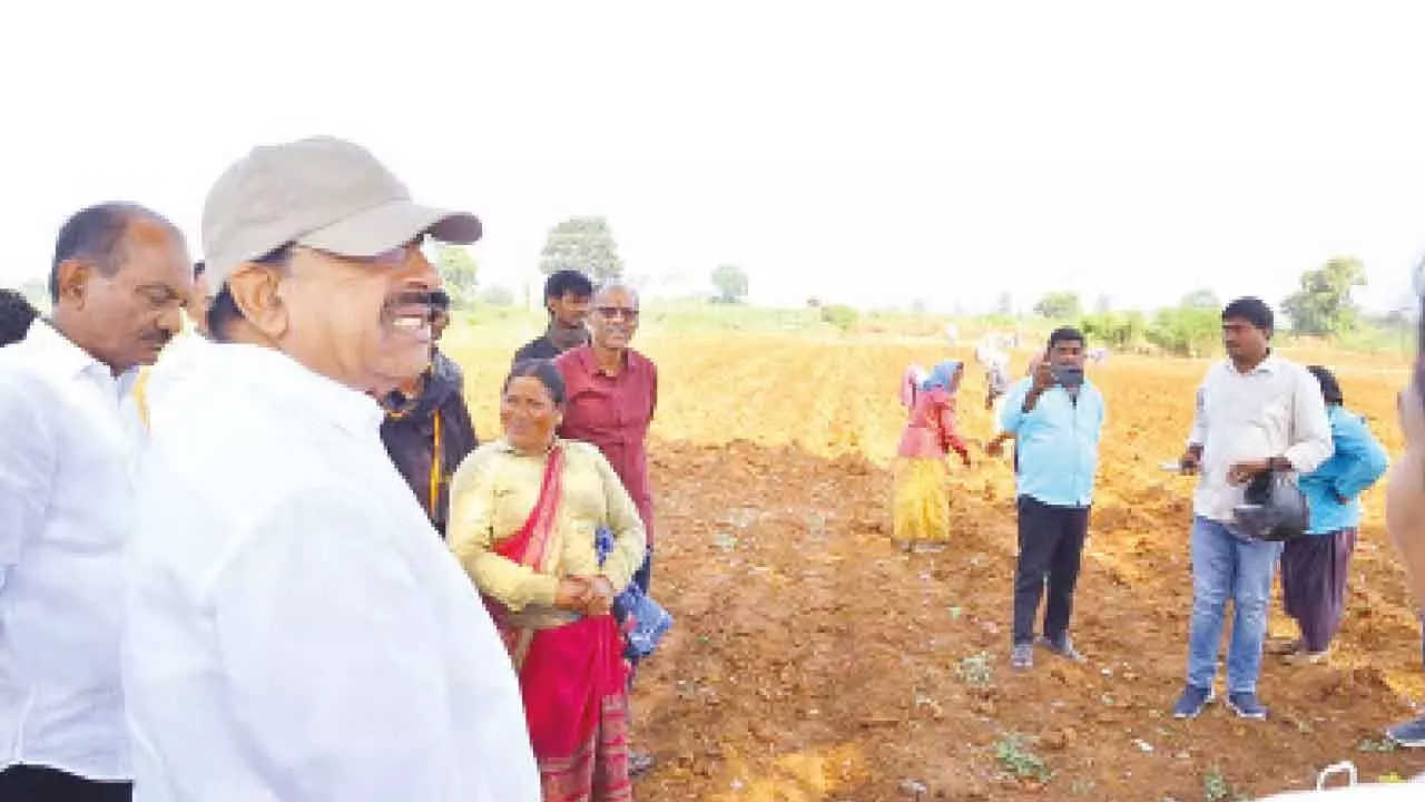Tummala interacts with farmers in Rajab Ali Nagar