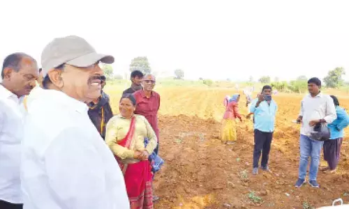 Tummala interacts with farmers in Rajab Ali Nagar