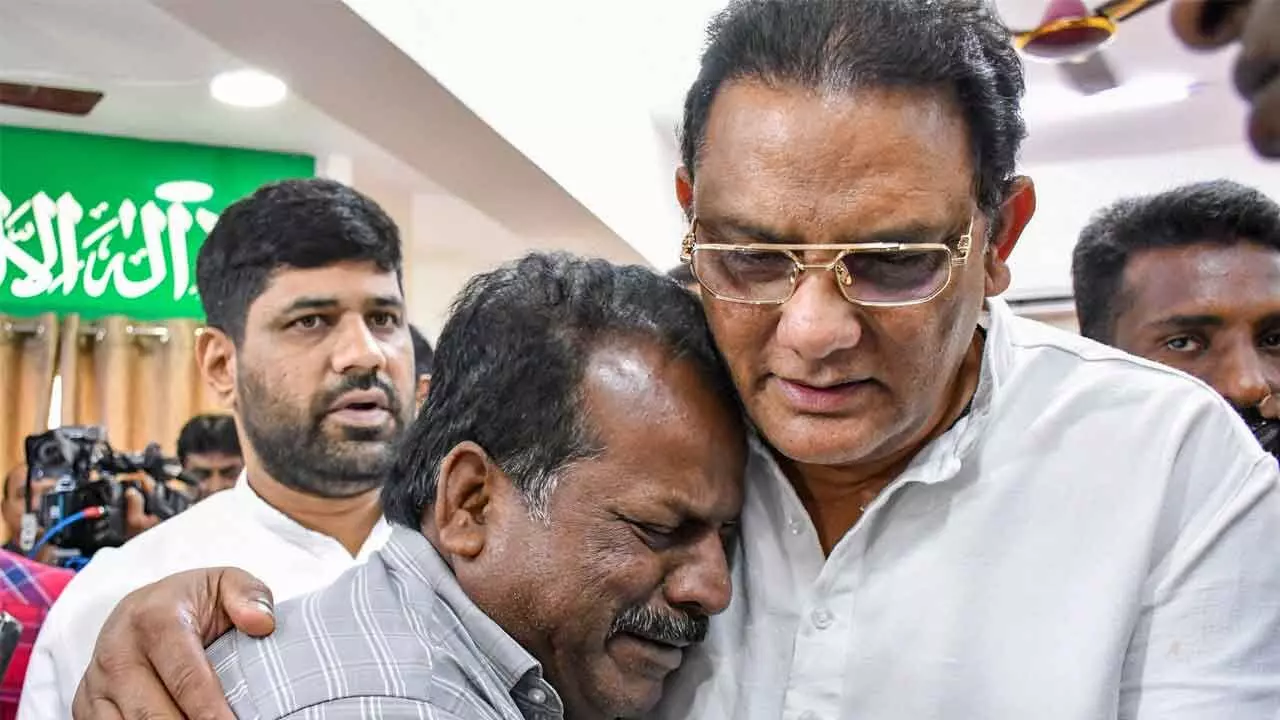 Minority Welfare Minister Mohammad Azharuddin consoles a relative of a victim in Hyderabad on Monday Minority Welfare Minister Mohammad Azharuddin consoles a relative of a victim in Hyderabad on Monday