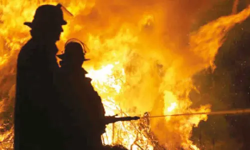 Policeman killed after fire breaks out in house