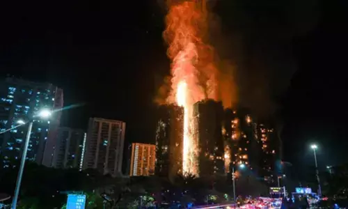 44 killed as fire engulfs high-rise Hong Kong buildings, 3 arrested