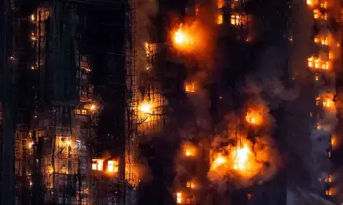 Death toll in Hong Kong fire mounts to 83