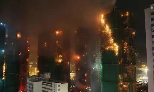 Hong Kong bldg blaze death toll soars to 128