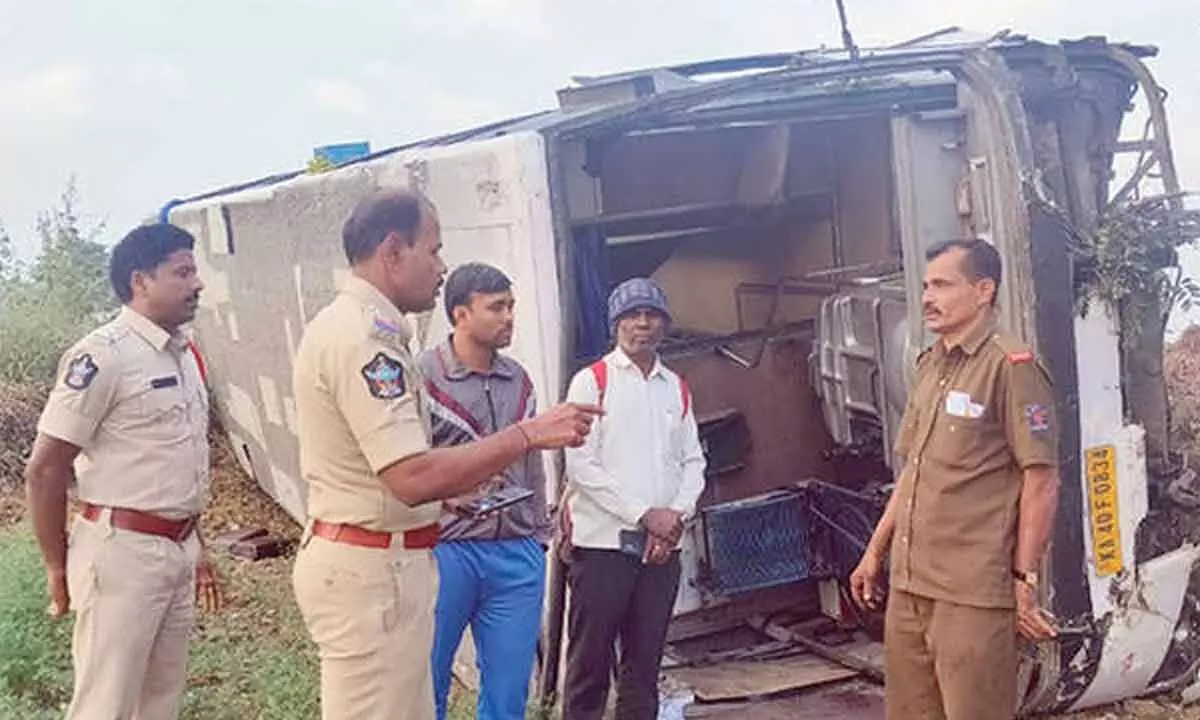 Pvt bus skids into field, 2 injured