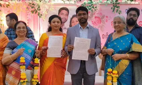 Couple solemnise marriage by taking oath on Constitution