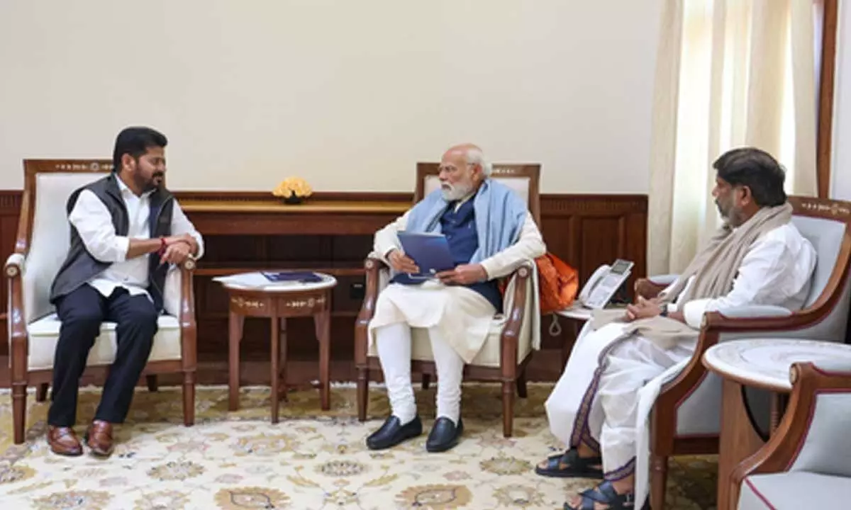 Telangana CM meets PM, extends invitation for Global Summit Telangana CM meets PM, extends invitation for Global Summit