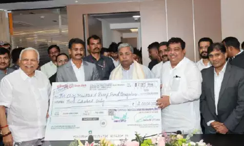 Industry Minister hands over Rs 2 cr dividend