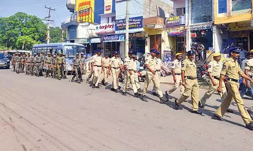 Flag march held in Kagaznagar ahead of local body elections Flag march held in Kagaznagar ahead of local body elections