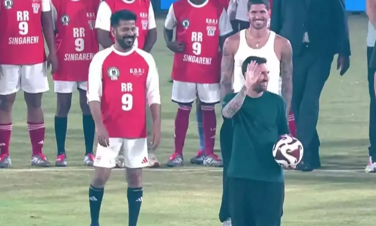 Revanth Reddy plays football with Lionel Messis, scores goal Revanth Reddy plays football with Lionel Messis, scores goal