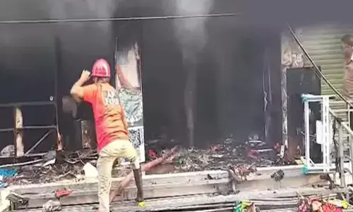 Fire Erupts at a shop in Gudivada, no casualties Fire Erupts at a shop in Gudivada, no casualties