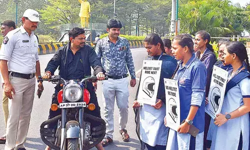 Helmet awareness drive held Helmet awareness drive held