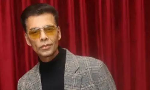 Karan Johar opens up about handling online trolls targeting him and his family