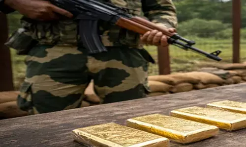 BSF arrests 2 smugglers along India-Bdesh border, seizes gold valued at over Rs 67 lakh BSF arrests 2 smugglers along India-Bdesh border, seizes gold valued at over Rs 67 lakh