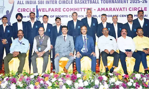 Bank employees exhibit their basketball expertise Bank employees exhibit their basketball expertise