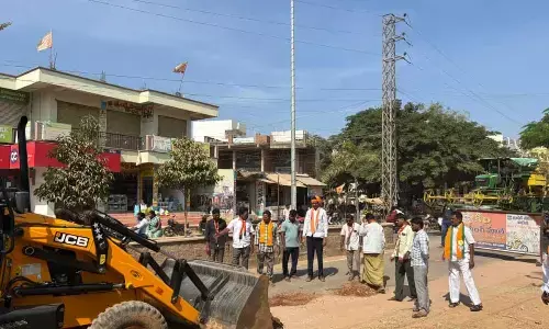 BJP Stages Protest by Filling Potholes on Aiza Main Road, Demands Immediate Repairs
