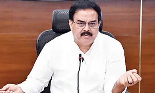 Minister Manohar patted for resolving 22A land issues