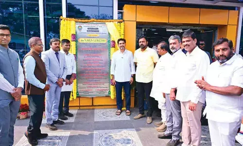 Lokesh inaugurates new buildings at Arts College, AKNU