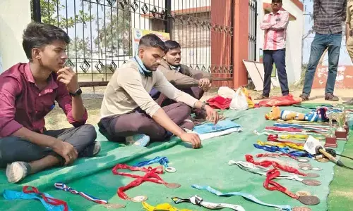 Khelo India athlete Lokesh Rathod stages protest, showcases medals won Khelo India athlete Lokesh Rathod stages protest, showcases medals won