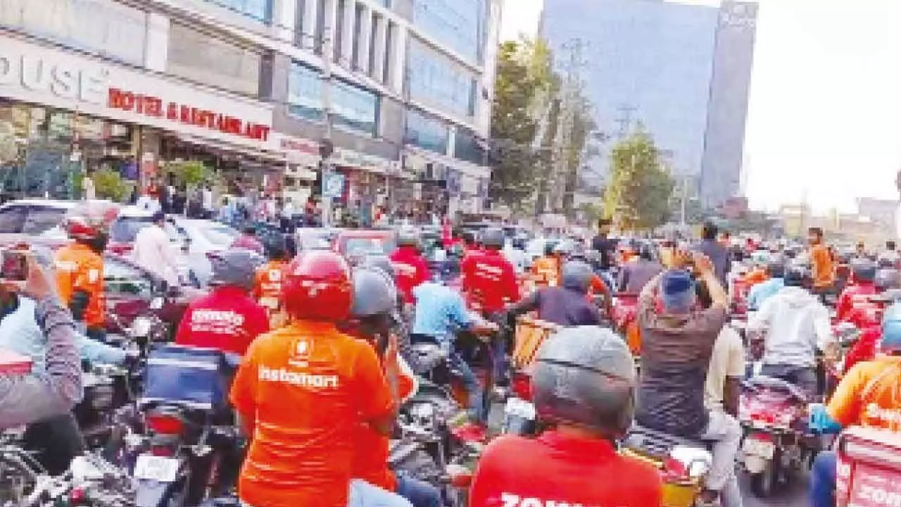 Delivery workers take to streets; hold bike rallies for better wages Delivery workers take to streets; hold bike rallies for better wages