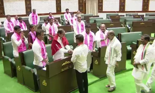 Chief Minister A Revanth Reddy exchanging pleasantries with Leader of Opposition K Chandrasekhar Rao in the House on Monday Chief Minister A Revanth Reddy exchanging pleasantries with Leader of Opposition K Chandrasekhar Rao in the House on Monday