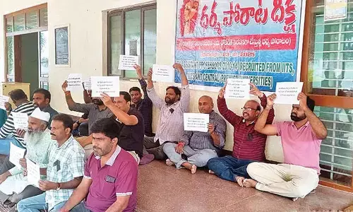 IIIT asst professors continue protest over pay revision