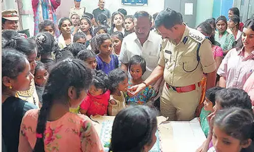 SP visits orphanage with family