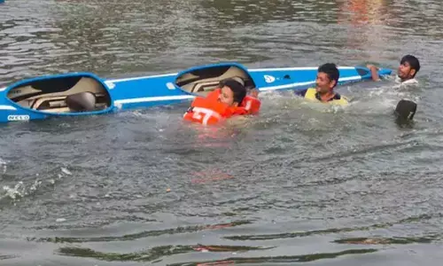 Collector Rescued After Falling into Canal During Boat Race Preparations