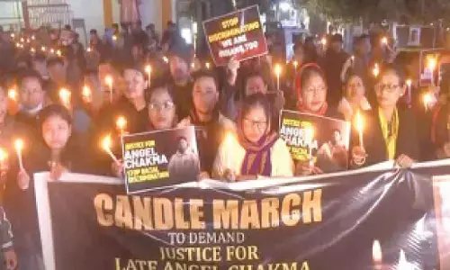 Northeast students hold candlelight march demanding justice for Anjel