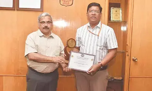 AU Professor bags national award