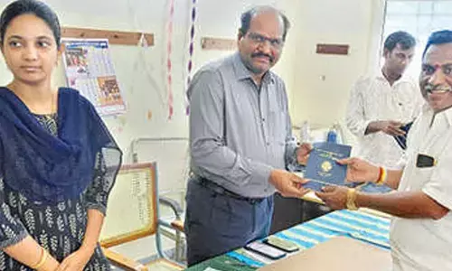 JC distributes new pattadar passbooks