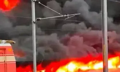 Massive fire guts 200 vehicles in TNs Thrissur railway station parking area Massive fire guts 200 vehicles in TNs Thrissur railway station parking area