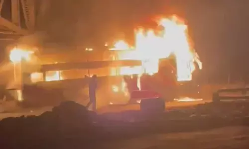 Private bus catches fire on Kovvuru flyover, no casualties