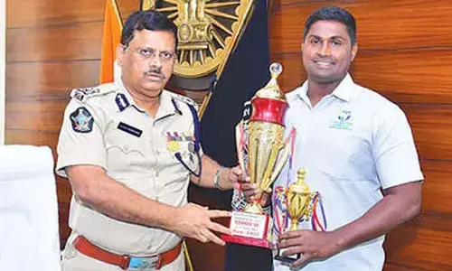 CP pats police swimmer Tulasi Chaitanya CP pats police swimmer Tulasi Chaitanya