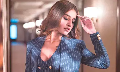 Priya Prakash showcases boss baby glam