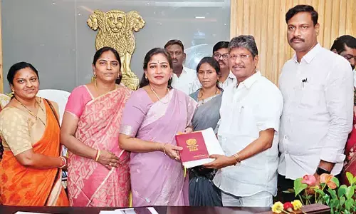 Minister Anitha unveils new year calendar, diary