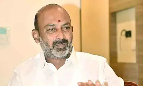 MoS Bandi Sanjay dares Owaisi to make burqa-clad woman AIMIM president MoS Bandi Sanjay dares Owaisi to make burqa-clad woman AIMIM president