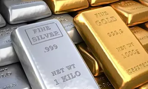 Gold, silver prices surge to fresh records