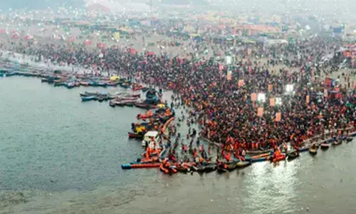 More Than 10 Million Devotees Gather At Prayagraj Sangam For Sacred Makar Sankranti Dip