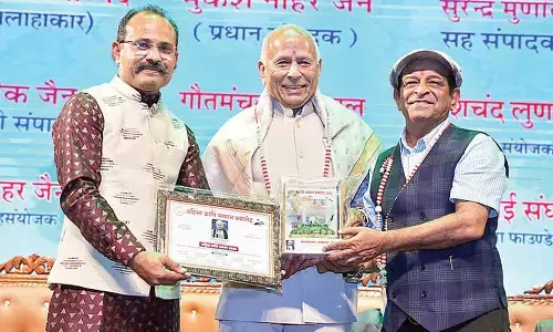 Social worker bags award for his significant charitable contributions