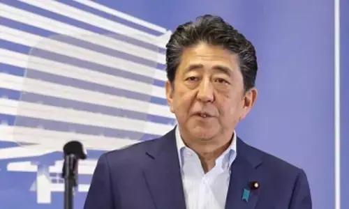 Japanese court sentences former PM Shinzo Abes killer to life in prison