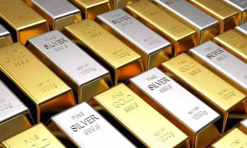 Gold, silver hit fresh records on global buying rush