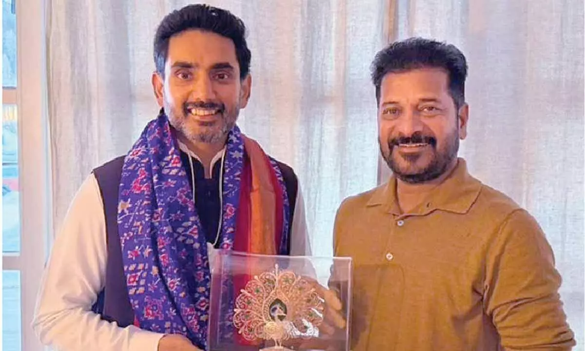 Lokesh, Revanth meet in Davos Lokesh, Revanth meet in Davos